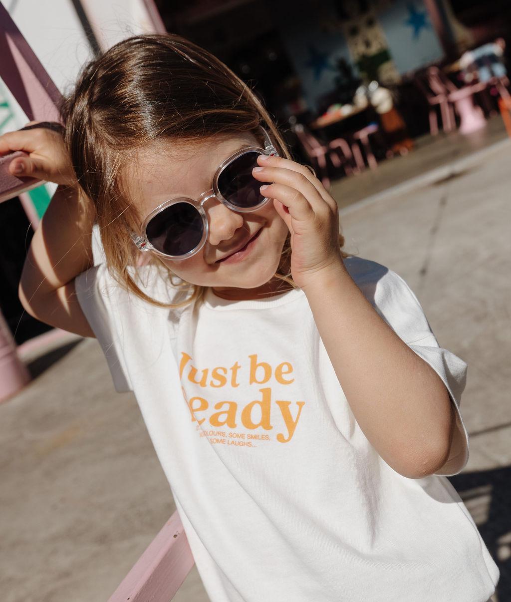 Lunettes de soleil enfant blanc transparent forme ronde verres foncés Hello Hossy