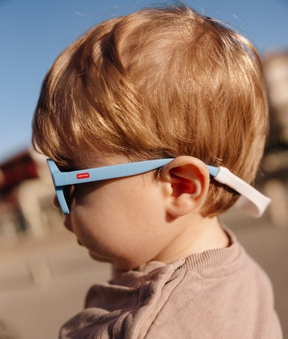 Sonnenbrillen Kinder blau dickes Brillengestell mit hinterem Verschluss Hello Hossy