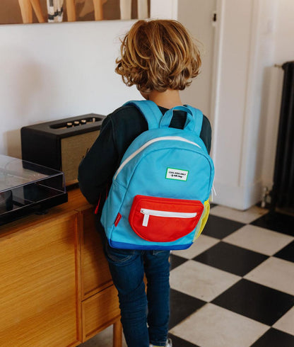 Sac à dos enfant bleu poche rouge détail jaune Hello Hossy